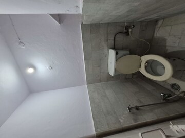 Bathroom in 1.5 BHK Apartment at Mayur Vihar – for Sale