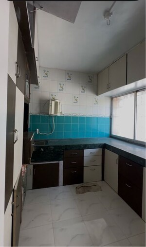 Kitchen in 2 BHK Apartment at Shri Chakradhar Vihar CHS, Vadgaon Budruk – for Rent