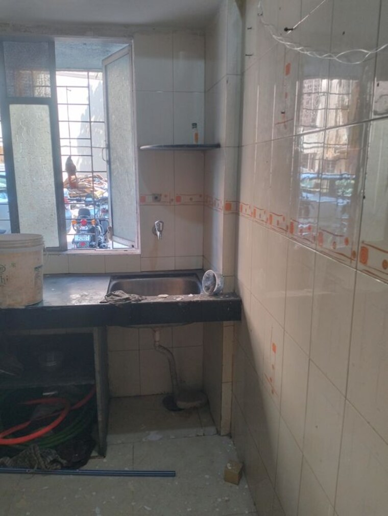 Kitchen, mira nagar 1 RK 350 Sq.Ft. Apartment In Mira Nagar Mumbai 10086579