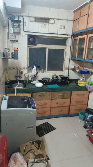 Kitchen in 2 BHK Apartment at Planet Powai CHS, Powai – for Rent