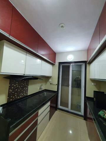 Kitchen in 2 BHK Apartment at Ravechi Heights, Kharghar – for Rent