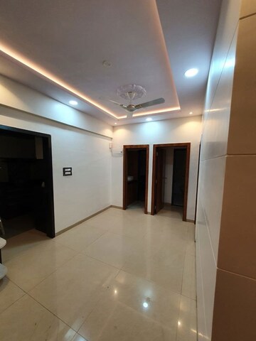 Living Room in 2 BHK Apartment at Ravechi Heights, Kharghar – for Rent