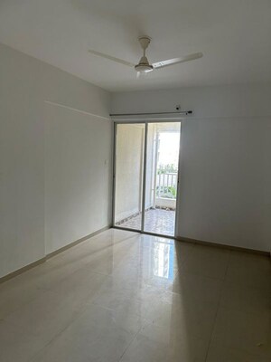 Bedroom in 2 BHK Apartment at Majestique Manhattan G Building, Wagholi – for Rent