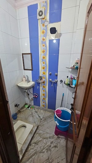 Bathroom in 2 BHK Builder Floor at Rohini Sector 25 – for Sale