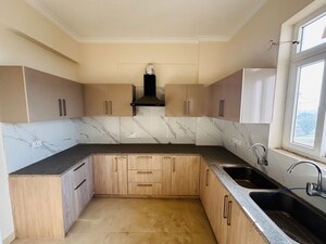 Kitchen in 3.5 BHK Apartment at Artique Uptown Skylla, International Airport Road – for Rent