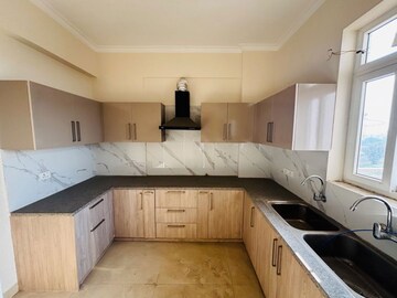 Kitchen in 3.5 BHK Apartment at Artique Uptown Skylla, International Airport Road – for Rent