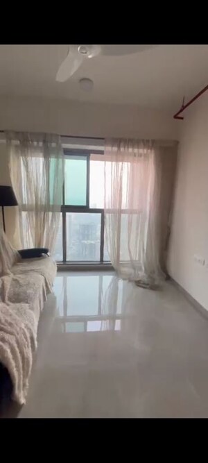 Living Room in 2 BHK Apartment at Sheth Auris Bliss, Malad West – for Rent