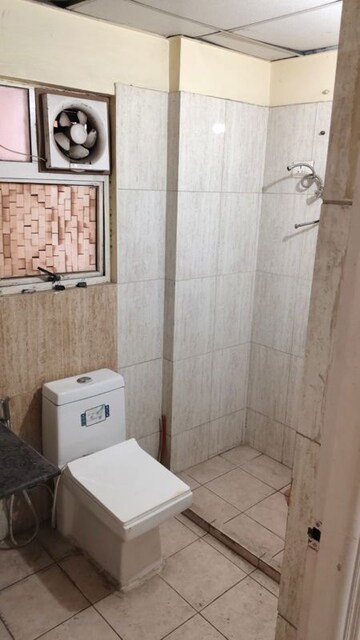 Bathroom in 2 BHK Apartment at Land Craft Golf Links Apartment Phase 2, Pandav Nagar – for Rent