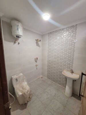Bathroom in 4 BHK Builder Floor at Ansal Palam Triangle, Palam Vihar Extension – for Rent