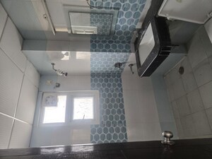 Bathroom in 3 BHK Apartment at Purvanchal Royal Park, Sector 137 – for Rent
