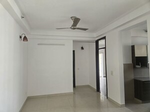 Building Lobby in 3 BHK Apartment at Purvanchal Royal Park, Sector 137 – for Rent