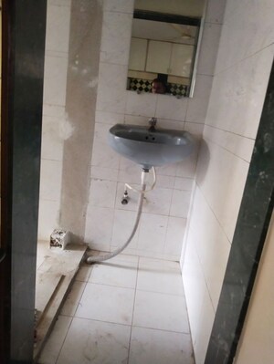 Bathroom in 3 BHK Apartment at Gokhale Saraswati Park, Ideal Colony – for Rent