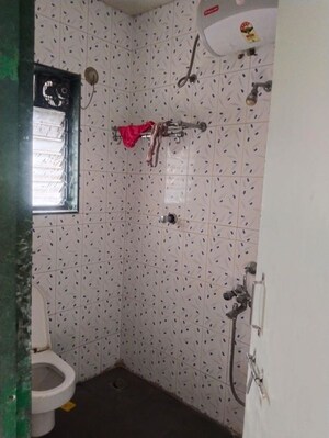 Bathroom in 3 BHK Apartment at Gokhale Saraswati Park, Ideal Colony – for Rent