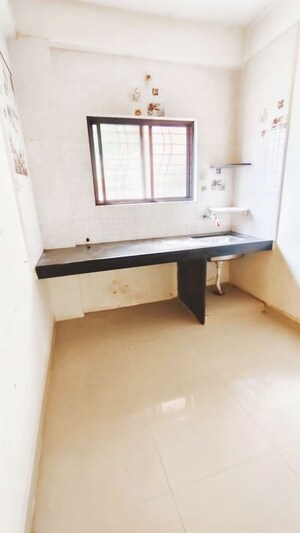 Kitchen in 1 BHK Apartment at Wadgaon Sheri – for Rent