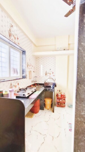 Kitchen in 1 BHK Apartment at Wadgaon Sheri – for Rent