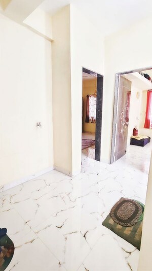 Building Lobby in 1 BHK Apartment at Wadgaon Sheri – for Rent