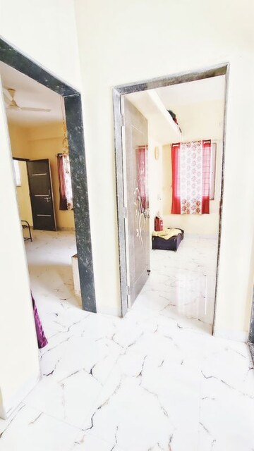 Building Lobby in 1 BHK Apartment at Wadgaon Sheri – for Rent