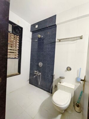 Bathroom in 4 BHK Apartment at Mont Vert Belair, Bhugaon – for Rent