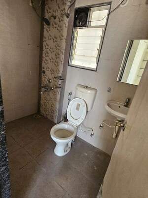 Bathroom in 2 BHK Apartment at Dhankawade Pokale Tamarind Park, Dhayari – for Rent