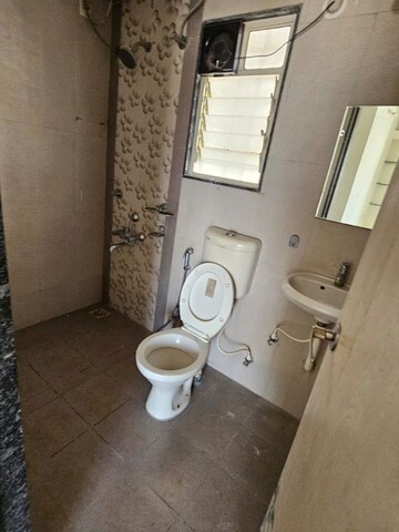 Bathroom in 2 BHK Apartment at Dhankawade Pokale Tamarind Park, Dhayari – for Rent