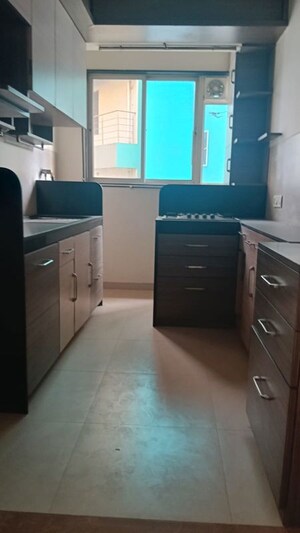 Kitchen in 1 BHK Apartment at Arham Meera Kunj, Vile Parle West – for Rent