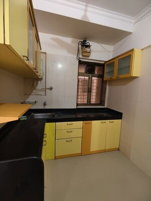 Kitchen in 2 BHK Apartment at Sadguru Complex I, Goregaon East – for Rent