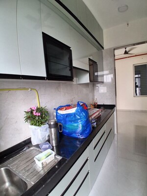 Kitchen in 2 BHK Apartment at Tricity Montview, Sanpada – for Rent