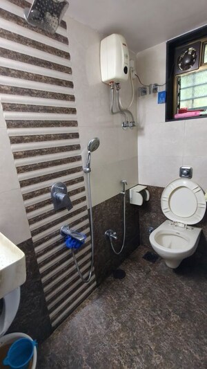 Bathroom in 1 RK Apartment at Vasant Valley Complex, Malad East – for Rent
