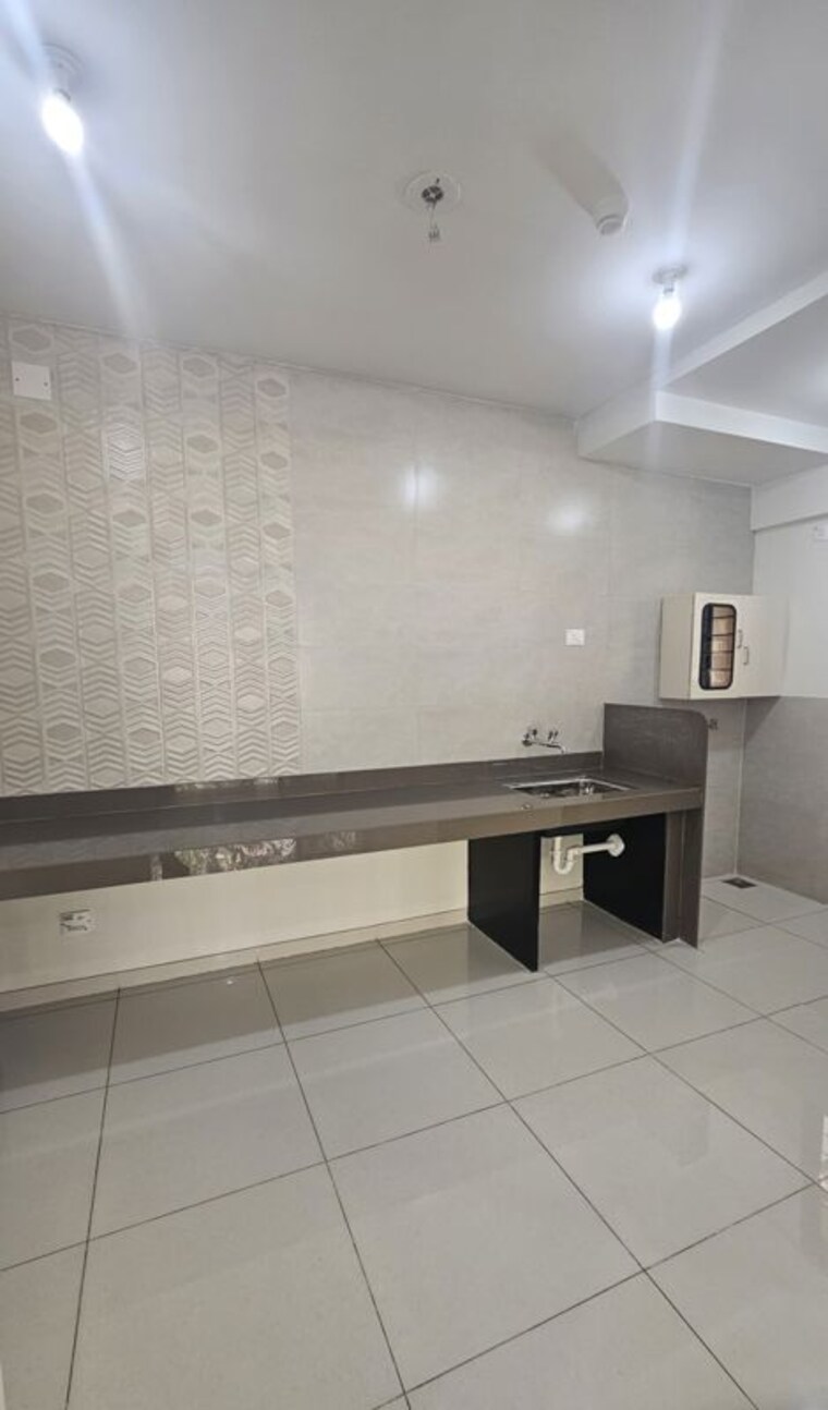 Kitchen, magarpatta-riverview-city-hornbill-heights 2.5 Bedroom 1100 Sq.Ft. Apartment In Loni Kalbhor Pune 10095838