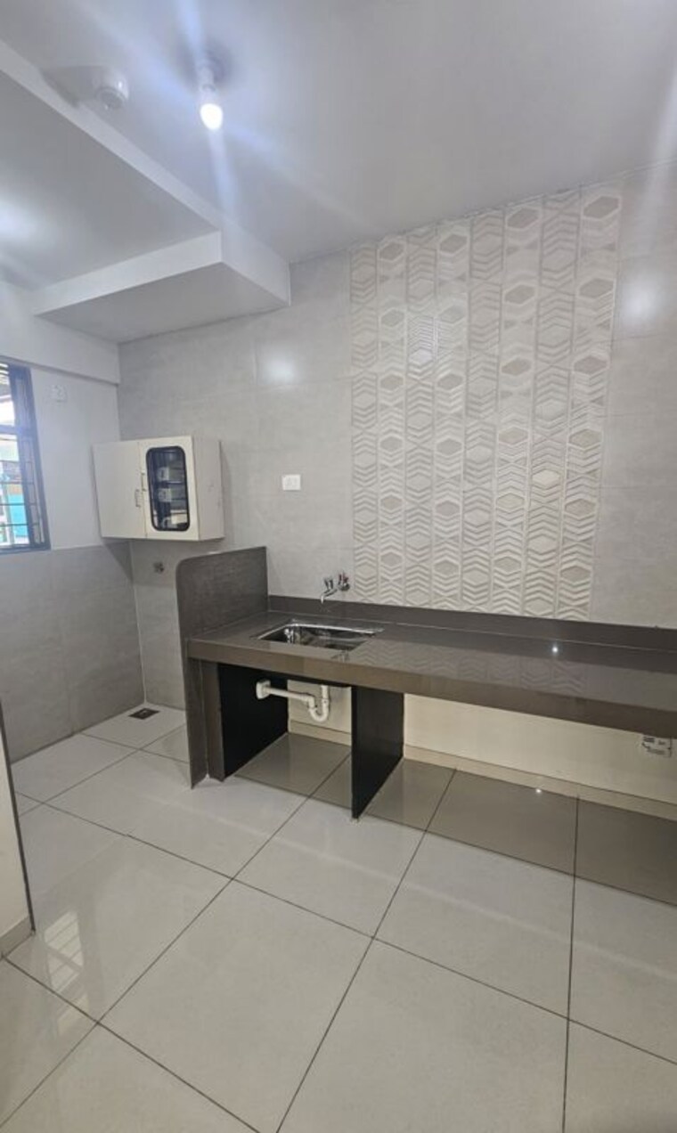 Kitchen, magarpatta-riverview-city-hornbill-heights 2.5 Bedroom 1100 Sq.Ft. Apartment In Loni Kalbhor Pune 10095859