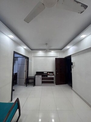 Kitchen in 2 BHK Apartment at Thakur Badrinath Tower, Andheri West – for Rent
