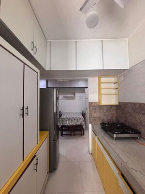 Kitchen in 2 BHK Apartment at Thakur Badrinath Tower, Andheri West – for Rent