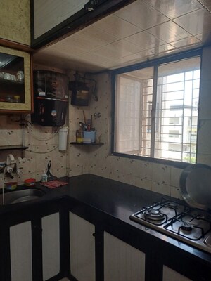 Kitchen in 2 BHK Apartment at Asmita Orchid, Mira Road – for Sale