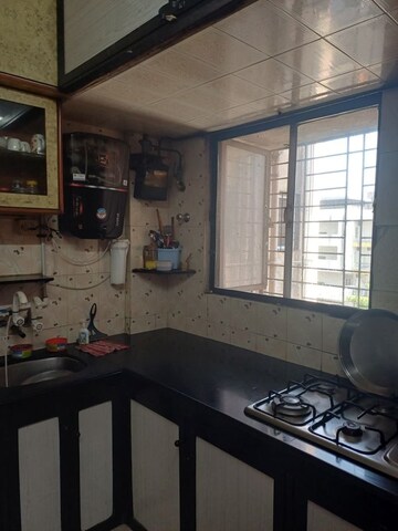 Kitchen in 2 BHK Apartment at Asmita Orchid, Mira Road – for Sale