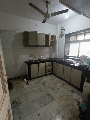 Kitchen in 1 BHK Apartment at Chanchal Kalyan Complex, Yari Road – for Rent