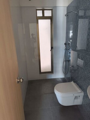 Bathroom in 3 BHK Apartment at Rajesh Raj Infinia, Malad West – for Rent