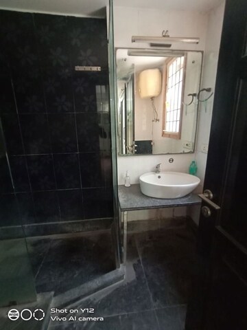 Bathroom in 3 BHK Builder Floor at Pamposh Enclave – for Rent