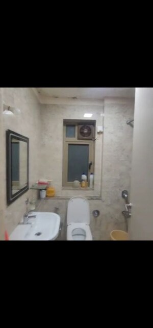 Bathroom in 2 BHK Apartment at Sheth Vasant Oasis, Andheri East – for Rent