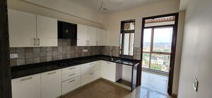 Kitchen in 4 BHK Apartment at Miramar – for Rent