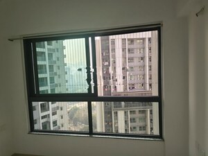 Room in 2 BHK Apartment at Kalpataru Immensa, Kolshet Road – for Rent