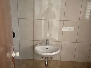 Bathroom in 2 BHK Apartment at Tru Windchimes, Bellandur – for Sale