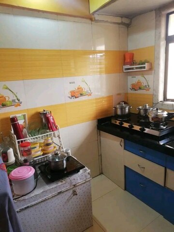 Kitchen in 1 BHK Apartment at Reliable Paradise CHS Nalasopara, Nalasopara West – for Sale