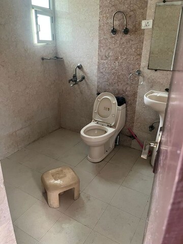 Bathroom in 2 BHK Apartment at Shyam Bankey Bihari Sharnam, Raj Nagar Extension – for Sale