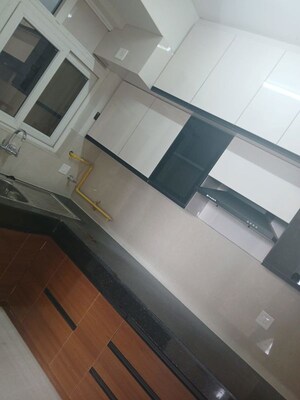 Kitchen in 2 BHK Apartment at Samridhi Luxuriya Avenue, Sector 150 – for Rent