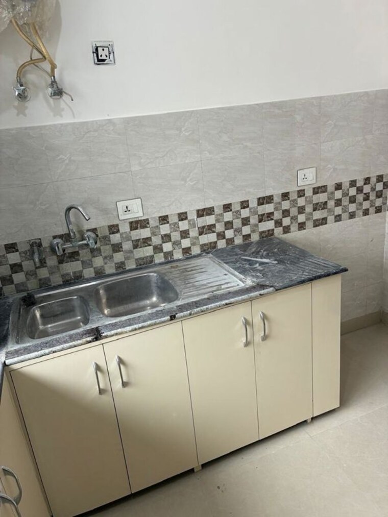 Kitchen, ansal-sushant-golf-city 4 Bedroom 1500 Sq.Ft. Independent House In Sushant Golf City Lucknow 10096386