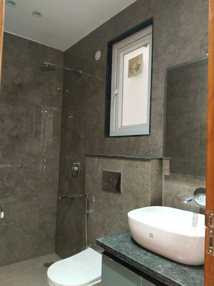 Bathroom in 3 BHK Builder Floor at Hong Kong Bazaar, Sector 57 – for Rent