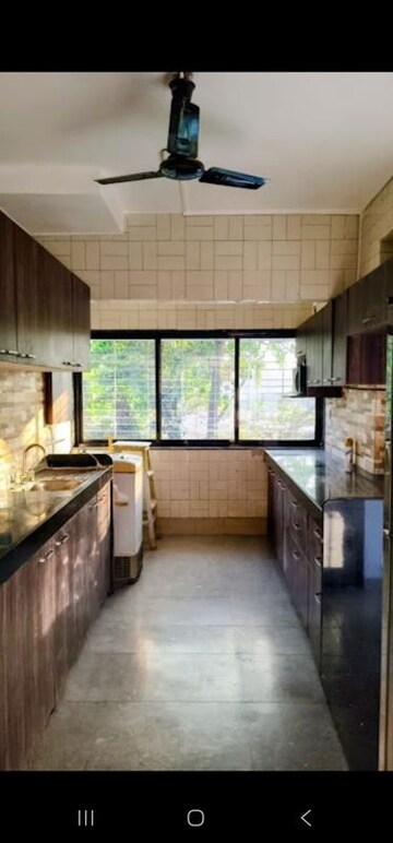 Kitchen in 2 BHK Apartment at Karachi Citizens CHS, Juhu – for Rent