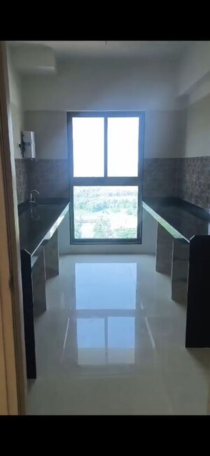 Kitchen in 2 BHK Apartment at Rajesh Raj Infinia, Malad West – for Rent