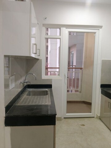 Kitchen in 2.5 BHK Apartment at Rishita Mulberry Heights, Sushant Golf City – for Rent