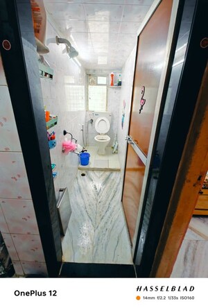 Bathroom in 2 BHK Apartment at Lalji Complex, Kandivali West – for Sale